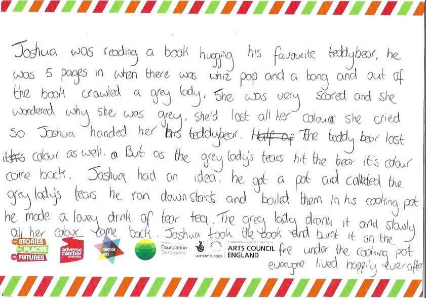 A handwritten story on a card with a colourful border featuring all the logos from the project.