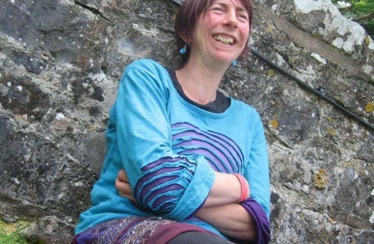 Photograph of Rachel Murray next to a wall